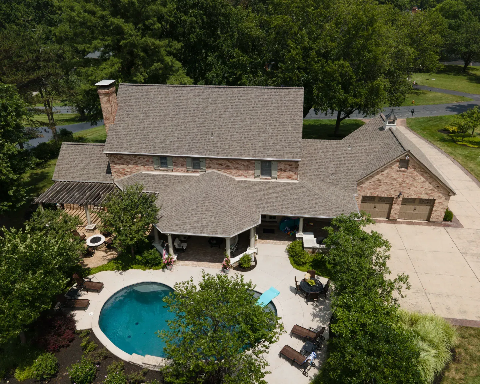 Brandon J Roofing professionals completing a roofing project