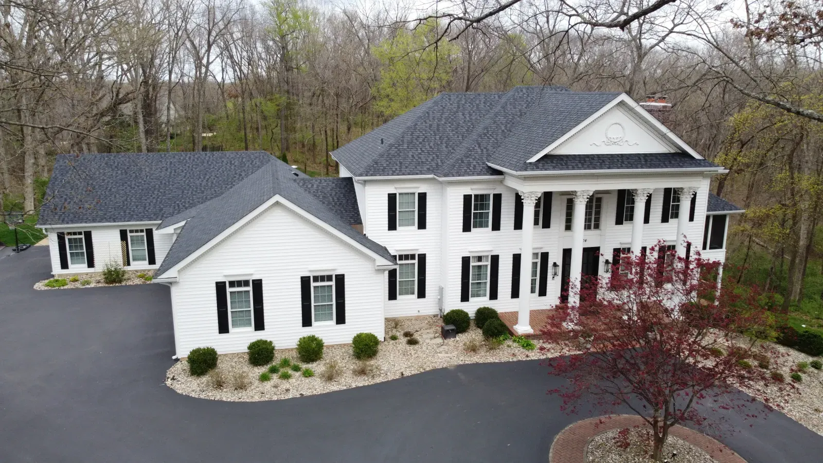 Brandon J Roofing professionals completing a roofing project