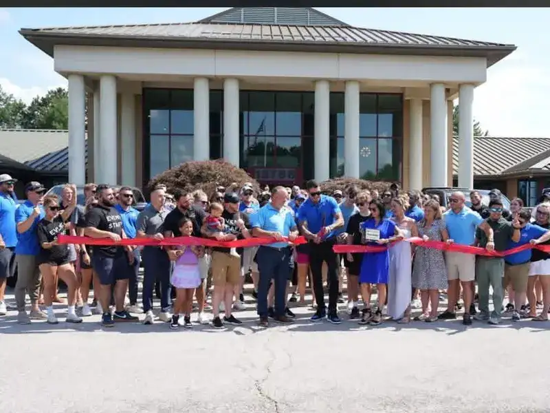 The Brandon J Roofing team at a ribbon-cutting event