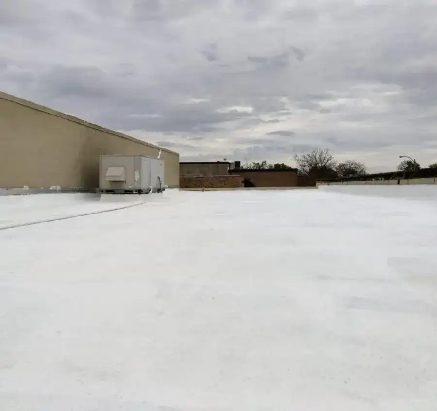 Finished white membrane flat roof on a commercial building