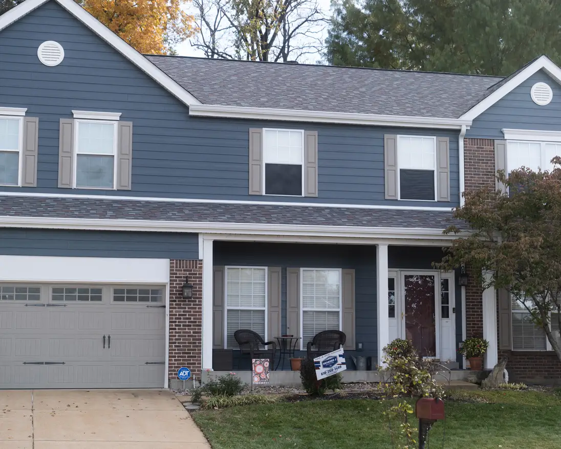 Final gutter installation — Brandon J Roofing project photo 1